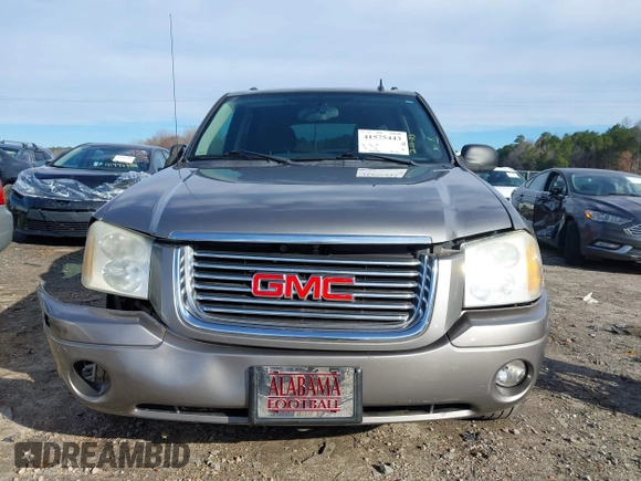 2007 GMC Envoy SLE with VIN 1GKDS13S372241844, listed as a IAAI auction lot 41575443 with 144,726 mi miles. Bid and sale history available at carsss.com. Image 12.