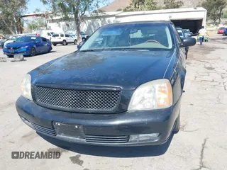 2002 Cadillac DeVille DTS z VIN 1G6KF579X2U134554, wystawiony jako IAAI lot #42244304 z przebiegiem 149 141 mil mil oraz . Historia ofert i sprzedaży dostępna na DreamBid. Obrazek 6.