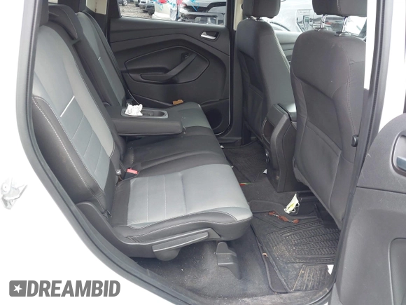 2014 Ford Escape SE z VIN 1FMCU9GX6EUE32418, wystawiony jako IAAI lot #42022304 z przebiegiem 100 216 mil mil oraz . Historia ofert i sprzedaży dostępna na DreamBid. Obrazek 8.