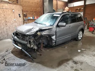 2009 Suzuki Grand Vitara z VIN JS3TD149494100142, wystawiony jako Copart lot #57888575 z przebiegiem Nie podano mil oraz Szkoda całkowita • Salvage title. Historia ofert i sprzedaży dostępna na DreamBid. Obrazek 1.