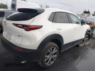 2023 Mazda CX-30 2.5 S Carbon Edition with VIN 3MVDMBCM9PM584887, listed as a IAAI auction lot 41571659 with 33,667 mi miles. Bid and sale history available at carsss.com. Image 4.