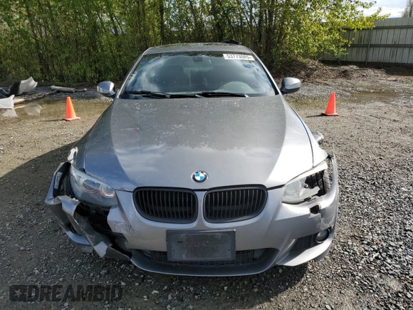 2011 BMW 3 Series 328i xDrive with VIN WBAKF5C57BE656436, listed as a Copart auction lot 53773085 with 122,920 mi miles and Salvage title. Bid and sale history available at DreamBid. Image 5.