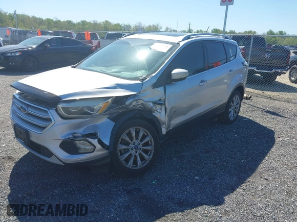 2018 Ford Escape Titanium with VIN 1FMCU9J96JUA33500, listed as a IAAI auction lot 42121736 with 105,430 mi miles and . Bid and sale history available at DreamBid. Image 2.