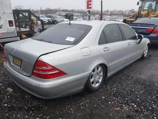 2001 Mercedes-Benz S-Class with VIN WDBNG75JX1A196406, listed as a IAAI auction lot 41682384 with 999,999 mi miles. Bid and sale history available at carsss.com. Image 4.