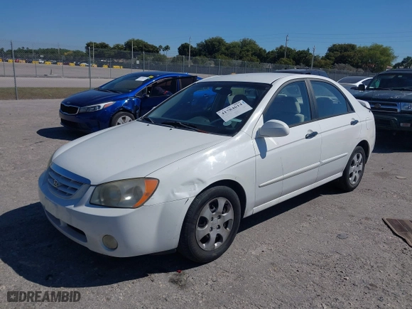 2004 Kia Spectra LX with VIN KNAFE121645055839, listed as a IAAI auction lot 41784614 with 118,874 mi miles. Bid and sale history available at carsss.com. Image 17.