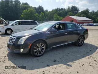 2013 Cadillac XTS Luxury z VIN 2G61P5S34D9212029, wystawiony jako Copart lot #61874985 z przebiegiem 145 762 mil mil oraz Czysty tytuł • Clean title. Historia ofert i sprzedaży dostępna na DreamBid. Obrazek 1.