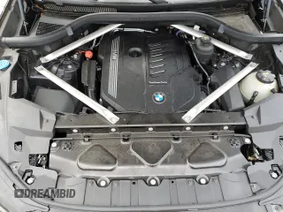 2021 BMW X5 z VIN NJ1541E, wystawiony jako Copart lot #37990264 z przebiegiem 18 321 mil mil oraz Szkoda całkowita • Salvage title. Historia ofert i sprzedaży dostępna na DreamBid. Obrazek 12.