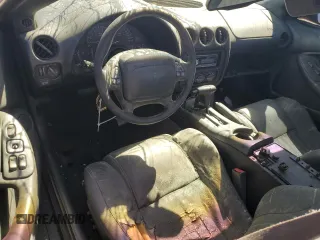 1998 Pontiac Firebird Formula z VIN 2G2FV22G4W2206032, wystawiony jako Copart lot #74949124 z przebiegiem 230 520 mil mil oraz Szkoda całkowita • Salvage title. Historia ofert i sprzedaży dostępna na DreamBid. Obrazek 8.