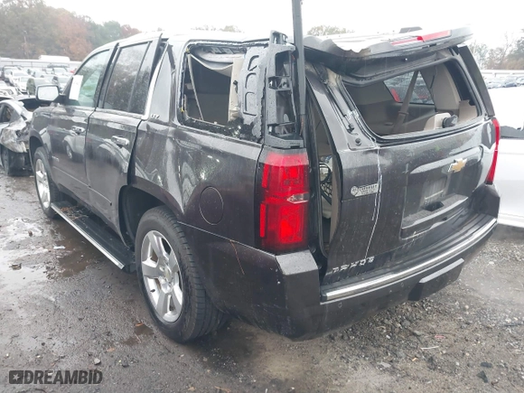 2015 Chevrolet Tahoe LTZ with VIN 1GNSCCKC7FR576236, listed as a IAAI auction lot 40794643 with 170,040 mi miles. Bid and sale history available at carsss.com. Image 3.