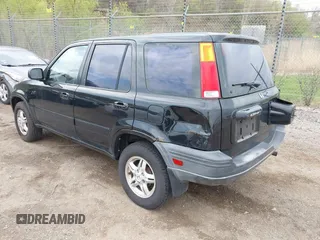 2001 Honda CR-V EX with VIN JHLRD186X1C038736, listed as a IAAI auction lot 42133407 with 222,378 mi miles. Bid and sale history available at carsss.com. Image 3.