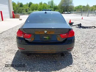 2016 BMW 4 Series 428i with VIN WBA3N7C55GK227677, listed as a IAAI auction lot 42048025 with 82,078 mi miles and . Bid and sale history available at carsss.com. Image 16.