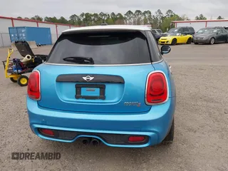 2017 MINI Hardtop 4 Door Cooper S z VIN WMWXU3C37H2F48944, wystawiony jako IAAI lot #41732140 z przebiegiem 154 563 mil mil oraz . Historia ofert i sprzedaży dostępna na DreamBid. Obrazek 16.