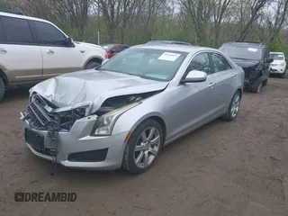 2014 Cadillac ATS Standard RWD z VIN 1G6AA5RA1E0177452, wystawiony jako IAAI lot #39138915 z przebiegiem 134 473 mil mil oraz . Historia ofert i sprzedaży dostępna na DreamBid. Obrazek 2.