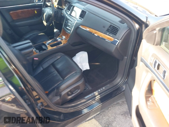 2014 Lincoln MKS with VIN 1LNHL9DKXEG606359, listed as a IAAI auction lot 41341206 with 286,687 mi miles and . Bid and sale history available at DreamBid. Image 5.