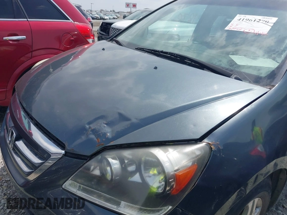 2005 Honda Odyssey EX with VIN 5FNRL38465B108123, listed as a IAAI auction lot 41961270 with 169,948 mi miles. Bid and sale history available at carsss.com. Image 13.