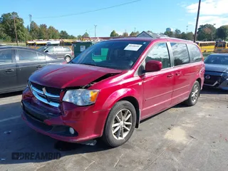 2014 Dodge Grand Caravan SXT with VIN 2C4RDGCG8ER311850, listed as a IAAI auction lot 40598088 with 138,010 mi miles and . Bid and sale history available at DreamBid. Image 17.