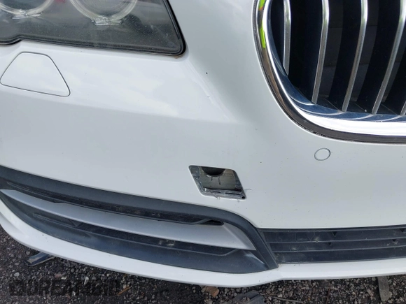 2014 BMW 5 Series 528i xDrive with VIN WBA5A7C5XED614926, listed as a IAAI auction lot 41535739 with 187,586 mi miles and . Bid and sale history available at DreamBid. Image 6.