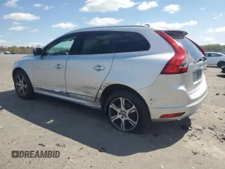 2014 Volvo XC60 R-Design Premier Plus z VIN YV4902DZ1E2543491, wystawiony jako Copart lot #51699955 z przebiegiem 114 688 mil mil oraz Szkoda całkowita • Salvage title. Historia ofert i sprzedaży dostępna na DreamBid. Obrazek 2.