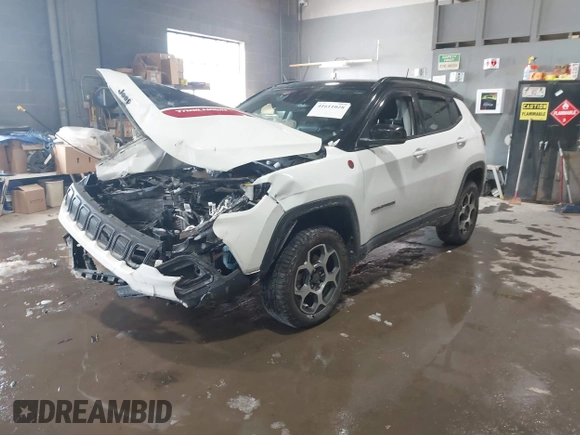 2022 Jeep Compass Trailhawk with VIN 3C4NJDDB8NT199704, listed as a IAAI auction lot 41611028 with 27,247 mi miles and . Bid and sale history available at DreamBid. Image 17.