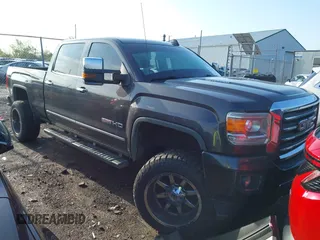 2015 GMC Sierra 2500HD SLT with VIN 1GT12ZE84FF553371, listed as a IAAI auction lot 42173249 with 247,703 mi miles and . Bid and sale history available at DreamBid. Image 1.