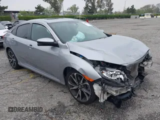 2018 Honda Civic Si with VIN 2HGFC1E50JH708274, listed as a IAAI auction lot 42034872 with 48,551 mi miles and . Bid and sale history available at DreamBid. Image 1.