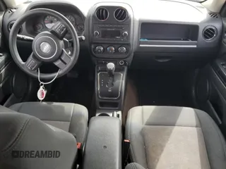 2013 Jeep Patriot Sport with VIN 1C4NJPBA9DD265273, listed as a Copart auction lot 52697955 with 154,472 mi miles and Salvage Title. Bid and sale history available at carsss.com. Image 8.