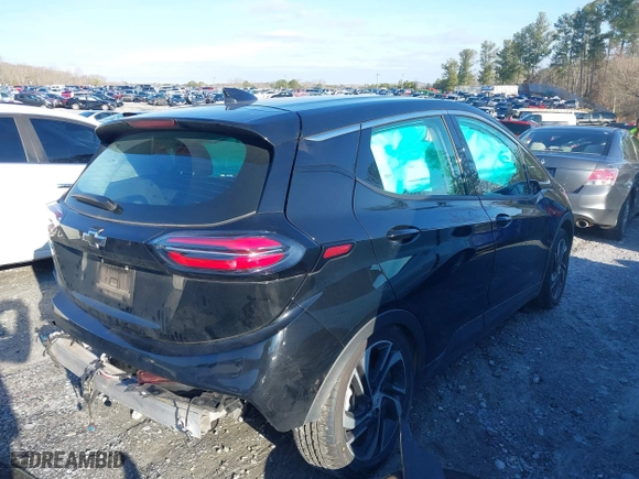 2023 Chevrolet Bolt EV 2LT with VIN 1G1FX6S05P4162790, listed as a IAAI auction lot 41549658 with 54,779 mi miles. Bid and sale history available at carsss.com. Image 4.
