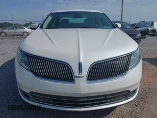 2013 Lincoln MKS EcoBoost with VIN 1LNHL9FT4DG614140, listed as a IAAI auction lot 42866991 with 126,487 mi miles and . Bid and sale history available at DreamBid. Image 6.
