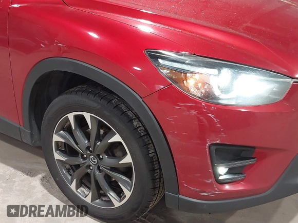 2016 Mazda CX-5 Grand Touring with VIN JM3KE4DY6G0690923, listed as a IAAI auction lot 41875553 with 179,489 mi miles. Bid and sale history available at carsss.com. Image 6.