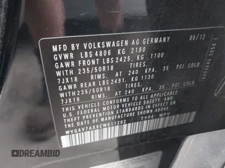 2012 Volkswagen Tiguan SE with VIN WVGAV7AX9CW611202, listed as a IAAI auction lot 41944210 with 118,002 mi miles and . Bid and sale history available at DreamBid. Image 9.