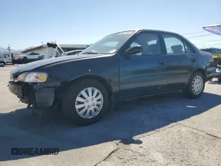 1999 Toyota Corolla VE with VIN 1NXBR12E5XZ266271, listed as a Copart auction lot 64027135 with 322,750 mi miles and Salvage title. Bid and sale history available at DreamBid. Image 1.