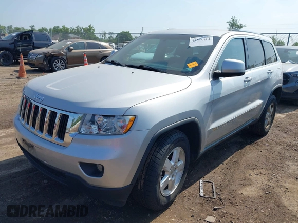2011 Jeep Grand Cherokee Laredo with VIN 1J4RR4GG0BC515356, listed as a IAAI auction lot 42581314 with 193,226 mi miles and . Bid and sale history available at DreamBid. Image 2.