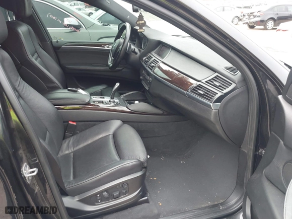 2014 BMW X6 50i with VIN 5UXFG8C54EL593152, listed as a IAAI auction lot 41439576 with 147,817 mi miles. Bid and sale history available at carsss.com. Image 5.