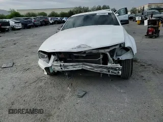 2007 Ford Mustang Deluxe z VIN 1ZVFT80N975326126, wystawiony jako Copart lot #53705085 z przebiegiem 77 431 mil mil oraz Szkoda całkowita • Salvage title. Historia ofert i sprzedaży dostępna na DreamBid. Obrazek 14.
