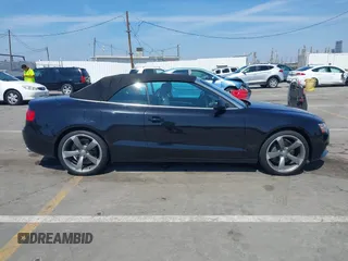 2014 Audi A5 Premium Plus z VIN WAULFAFHXEN010699, wystawiony jako IAAI lot #41868013 z przebiegiem 40 305 mil mil oraz . Historia ofert i sprzedaży dostępna na DreamBid. Obrazek 13.