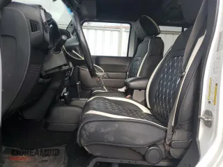 2012 Jeep Wrangler Unlimited Sport z VIN 1C4BJWDG9CL169159, wystawiony jako Copart lot #83647894 z przebiegiem 120 684 mil mil oraz Szkoda całkowita • Salvage title. Historia ofert i sprzedaży dostępna na DreamBid. Obrazek 7.