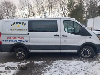 2019 Ford Transit with VIN 1FTYR1YMXKKA90870, listed as a IAAI auction lot 41327304 with 92,865 mi miles and . Bid and sale history available at DreamBid. Image 13.