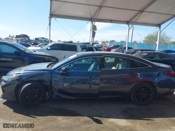 2019 Toyota Avalon Hybrid Limited with VIN 4T1B21FB9KU004539, listed as a IAAI auction lot 41784328 with 99,811 mi miles. Bid and sale history available at carsss.com. Image 14.