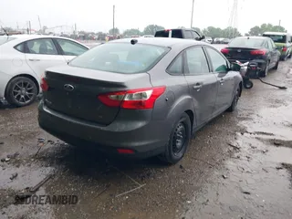 2012 Ford Focus SE z VIN 1FAHP3F20CL138736, wystawiony jako IAAI lot #42315862 z przebiegiem 231 570 mil mil oraz . Historia ofert i sprzedaży dostępna na DreamBid. Obrazek 4.
