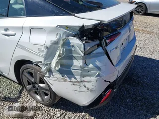 2021 Toyota Prius L Eco z VIN JTDKAMFUXM3142402, wystawiony jako IAAI lot #41665484 z przebiegiem 67 416 mil mil oraz . Historia ofert i sprzedaży dostępna na DreamBid. Obrazek 6.