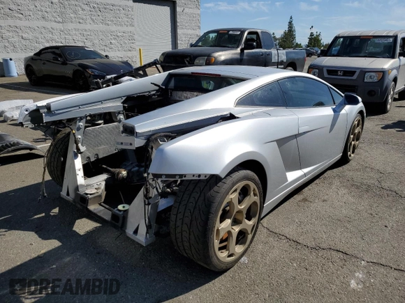 2004 Lamborghini Gallardo z VIN ZHWGU11M94LA01754, wystawiony jako Copart lot #67935984 z przebiegiem 17 188 mil mil oraz Szkody całkowita. Historia ofert i sprzedaży dostępna na DreamBid. Obrazek 3.