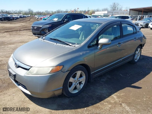 2008 Honda Civic Sdn EX with VIN 1HGFA15888L010234, listed as a IAAI auction lot 41973572 with 313,929 mi miles. Bid and sale history available at carsss.com. Image 2.
