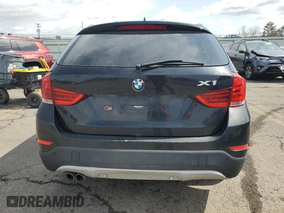 2014 BMW X1 xDrive28i z VIN WBAVL1C5XEVY20300, wystawiony jako Copart lot #51334275 z przebiegiem 175 652 mil mil oraz Tytuł czysty. Historia ofert i sprzedaży dostępna na DreamBid. Obrazek 6.