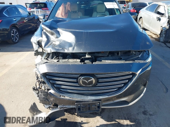 2020 Mazda CX-9 Signature with VIN JM3TCBEYXL0410265, listed as a IAAI auction lot 41226109 with Not Provided miles and . Bid and sale history available at carsss.com. Image 12.