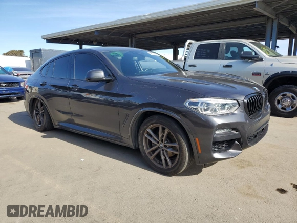2020 BMW X4 xDrive30i with VIN 5UX2V1C04L9C32419, listed as a Copart auction lot 46427975 with 58,623 mi miles and Salvage Title. Bid and sale history available at carsss.com. Image 4.