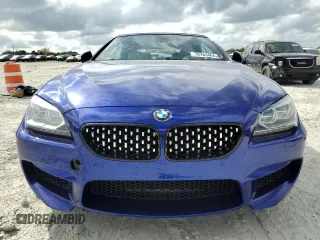 2012 BMW M6 z VIN WBSLZ9C5XCC985501, wystawiony jako Copart lot #78783464 z przebiegiem 80 961 mil mil oraz Czysty tytuł • Clean title. Historia ofert i sprzedaży dostępna na DreamBid. Obrazek 5.
