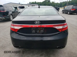 2013 Hyundai Azera with VIN KMHFH4JGXDA198345, listed as a Copart auction lot 58256945 with 102,711 mi miles and Salvage title. Bid and sale history available at DreamBid. Image 6.