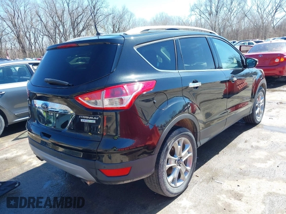 2014 Ford Escape Titanium with VIN 1FMCU0JX1EUE12260, listed as a IAAI auction lot 41826246 with 178,532 mi miles. Bid and sale history available at carsss.com. Image 4.