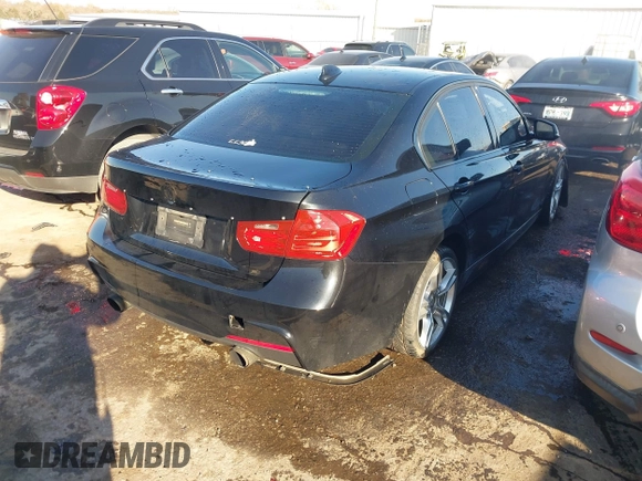 2014 BMW 3 Series 335i with VIN WBA3A9G55ENS64791, listed as a IAAI auction lot 40997669 with 65,335 mi miles. Bid and sale history available at carsss.com. Image 4.