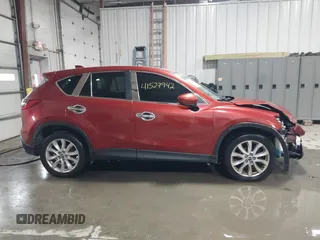2013 Mazda CX-5 Grand Touring with VIN JM3KE2DE3D0120609, listed as a IAAI auction lot 41527942 with 215,176 mi miles. Bid and sale history available at carsss.com. Image 13.